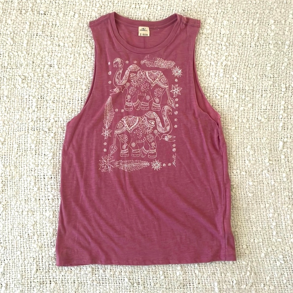 T-shirt material, cut off tank. Cute mauve color, very soft